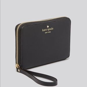 SOLD Kate spade zip around wristlet